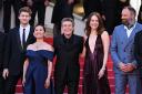 Joe Alwyn, Hong Chau, Willem Dafoe, Emma Stone and Yorgos Lanthimos attend the Kinds Of Kindness premiere during the 77th Cannes Film Festival in Cannes, France (Doug Peters/PA)