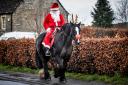 Early sighting of Santa on Saturday, riding down London Road in Chippenham. Photo by www.gphillipsphotography.com GP1824