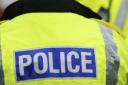 Police are searching for witnesses after the three men forced their way into the home and threatened the people inside