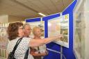 Westbury residents study the plans for the proposed new Lidl store. Photo: Trevor Porter 58690/2