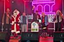 Chippenham's Christmas light switch on with special guest television star, Joe Pasquale. Also on the stage in the market place last Friday evening were the 4Tune Tellers and Heart FM's Breakfast's Ben and Mel..Pictured at the countdown for the
