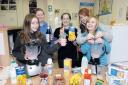 Westbury Youth centre members Amy and Sophie, left, with Tiffany and Lauren (right), youth centre manager Sally Willox and their smoothies