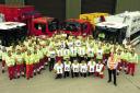 Mike Hill, front right in the orange jacket, with the rest of the Compton Bassett Hills Waste Depot team celebrating one million tonnes of waste collected