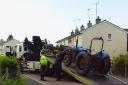 Police tow away the tractor