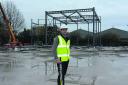 Legal and General senior asset manager Tim Russell check out progress on the emerging multi-screen cinema structure at the Trowbridge leisure site