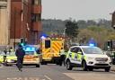 Emergency services attend Wood Street after incident closes road