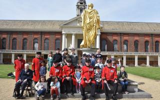 Two young girls from Salisbury meet the Chelsea Pensioners