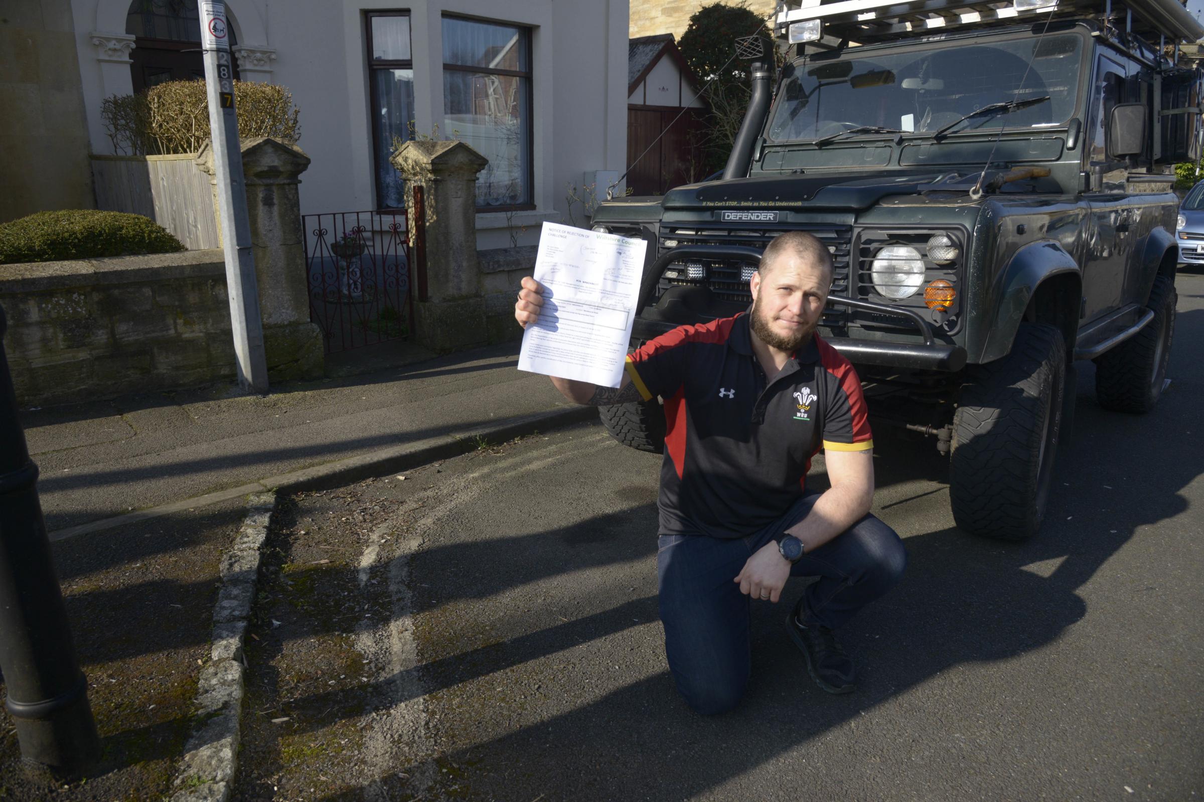 Gary Zelley fighting the council over a parking fine on removed yellow lines Photo Trevor Porter 