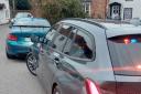 A blue BMW with a rear spoiler was pulled over by Wiltshire Police