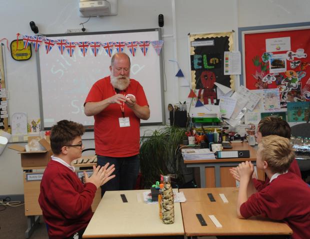 This Is Wiltshire: Animator from Wallace and Grommet Jim Parkyn gives a masterclass producing models of Shaun the Sheep with students at Silverwood school. Photo: Trevor Porter.