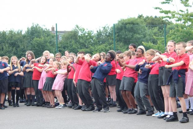 This Is Wiltshire: 900 pupils and staff members signed the song together
