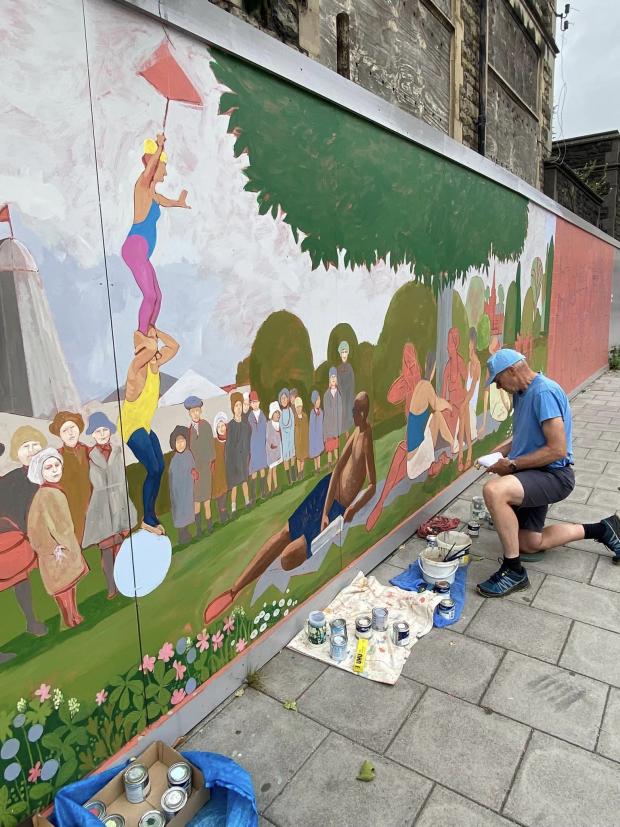 This Is Wiltshire: The 'Health and Wellbeing' mural takes shape. Picture: CARYN KOH