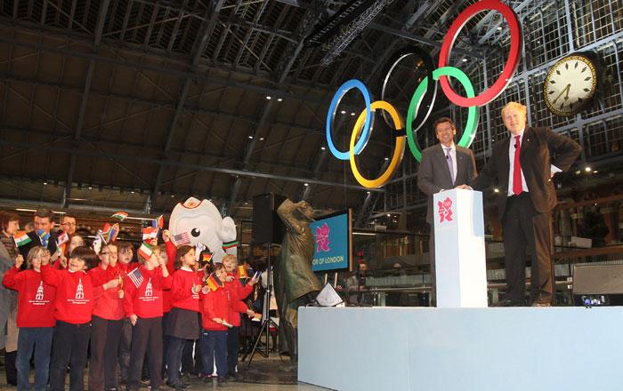The first set of giant Olympic Rings are unveiled at St Pancras International station in London.