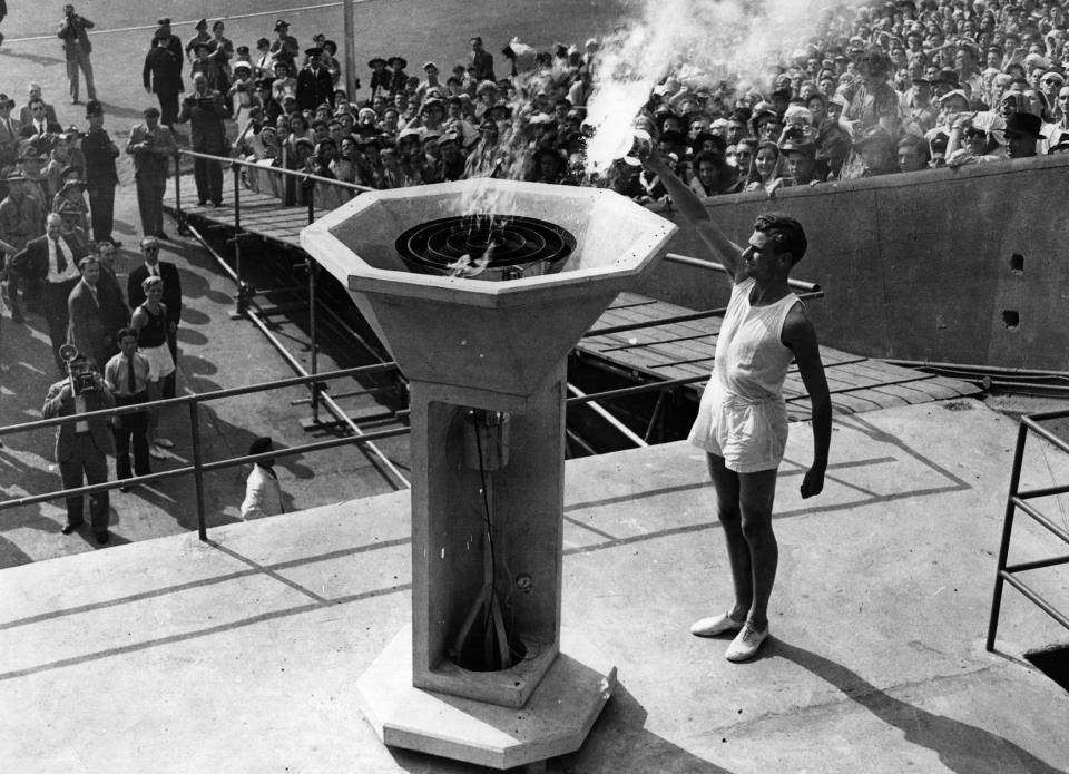 The Olympic Flame is lit at the Opening Ceremony of the Olympic Games at Wembley Stadium, London, on 29th July 1948 - 64 years later and it's soon to happen again!