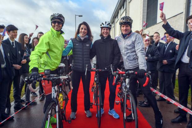 ©Calyx Picture Agency The cyclists leave Swindon's Nova Hreod Academy on the next leg of their cycling marathon for Sport Relief cheered on by Olympic medalist Shelly Rudman.